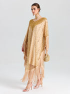 A woman models the Social Queen Beaded Fringe Cape Dress with a matching handbag, standing against a plain white background.