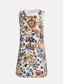 The Social Queen Jewel-Embellished Floral Mini Dress is a sleeveless white dress adorned with colorful gemstone-inspired patterns across the front.