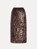 The Ombre Sequin Velvet Skirt by Social Queen is a knee-length brown skirt featuring a fitted waistband, ombré sequins, and a textured, shimmering pattern.