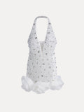 The Social Queen Pearl-Crystal Embellished Floral Hem Mini Dress features a white halter design, deep V neckline, pearl details, and large fabric flowers at the hem.