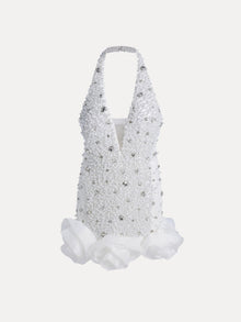 The Social Queen Pearl-Crystal Embellished Floral Hem Mini Dress features a white halter design, deep V neckline, pearl details, and large fabric flowers at the hem.