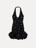 The Social Queen Pearl-Crystal Embellished Floral Hem Mini Dress features a black halter-neck design with crystals, beads, pearls, a deep V neckline, and a ruffled floral hem.