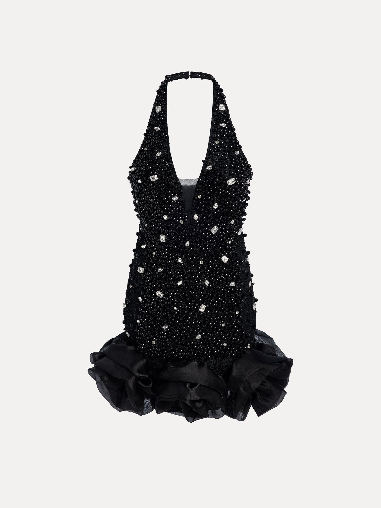 The Social Queen Pearl-Crystal Embellished Floral Hem Mini Dress features a black halter-neck design with crystals, beads, pearls, a deep V neckline, and a ruffled floral hem.
