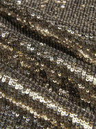 Close-up view of the Social Queen Pearl-Trim Sequin Fringe Skirt, featuring hand-applied gold sequins for a textured, reflective finish.