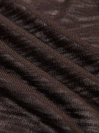 Close-up of brown ribbed fabric with a textured, wavy pattern, ideal for the Rose-Tie Neck Knit Cardigan by Social Queen. Perfect for creating a modern sleeveless or cropped fitted look.