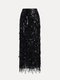 The Sequin Fringe Side-Slit Midi Skirt by Social Queen features a black high waist, straight silhouette, and fringe trim at the hem, shown against a plain white background.