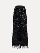 Social Queen's Sequin Fringe Wide-Leg Pants feature a black high-waist design with dense sequins, a drawstring waist, and fringe at the hem, shown against a plain background.