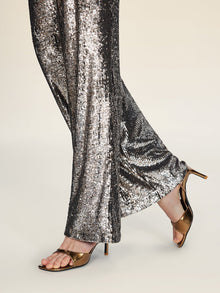 A person wearing Social Queen's Sequin High-Waist Wide-Leg Pants and bronze high-heeled sandals stands on a neutral background.