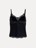 The Social Queen Stretch Velvet Camisole with Embossed Lace features a vintage-inspired design, delicate lace neckline, thin adjustable straps, scalloped trim, and a center front bow detail.