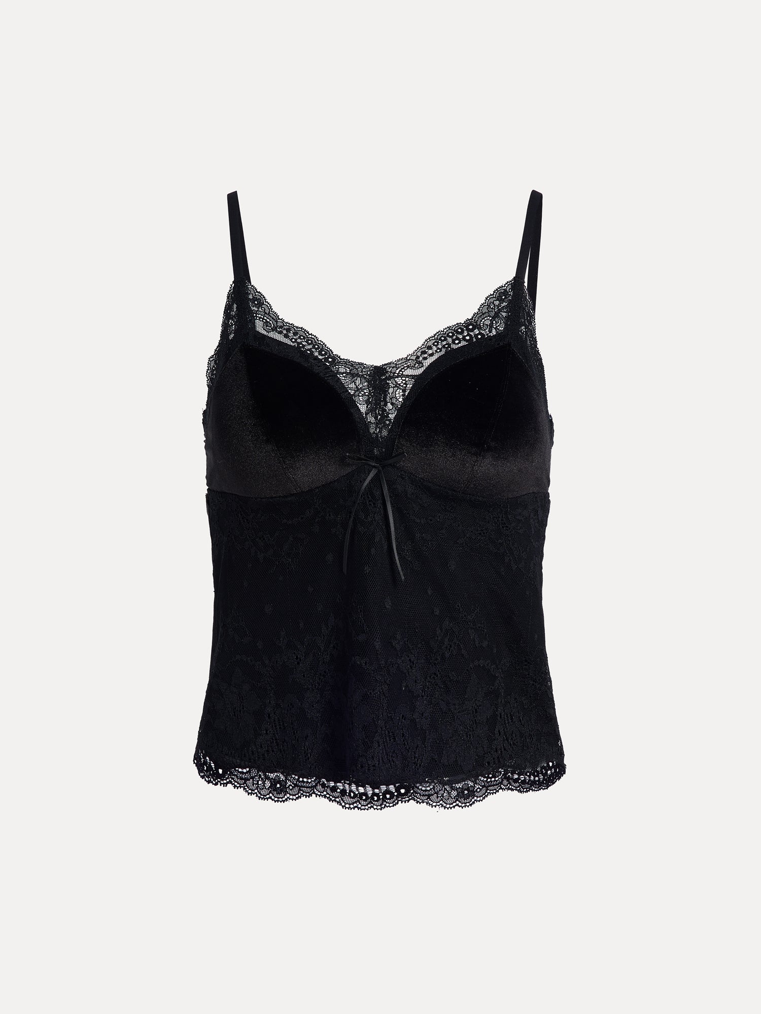 The Social Queen Stretch Velvet Camisole with Embossed Lace features a vintage-inspired design, delicate lace neckline, thin adjustable straps, scalloped trim, and a center front bow detail.