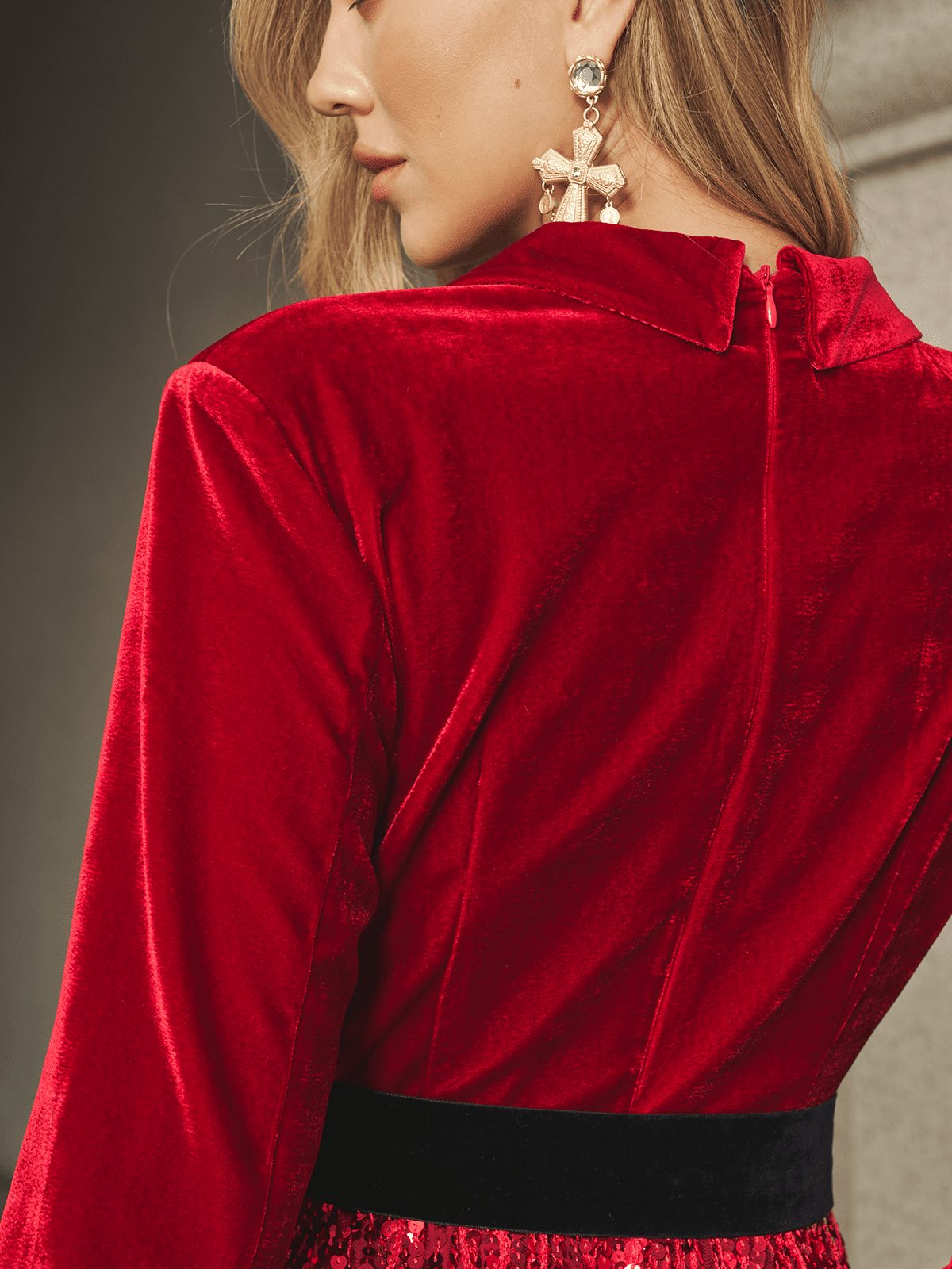 A woman models the Social Queen Velvet Fringe Sequin Dress, shown from the back and side with statement earrings—a stunning wedding guest choice.