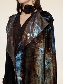 A woman wears the Social Queen Velvet Gradient Tie-Waist Trench Coat over a black top, styled with gold earrings and a fabric choker flower.