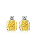 The Social Queen Yellow Crystal Stud Earrings feature rectangular yellow crystals in prong settings with small round white stones, making them elegant wedding guest jewelry for any outfit.
